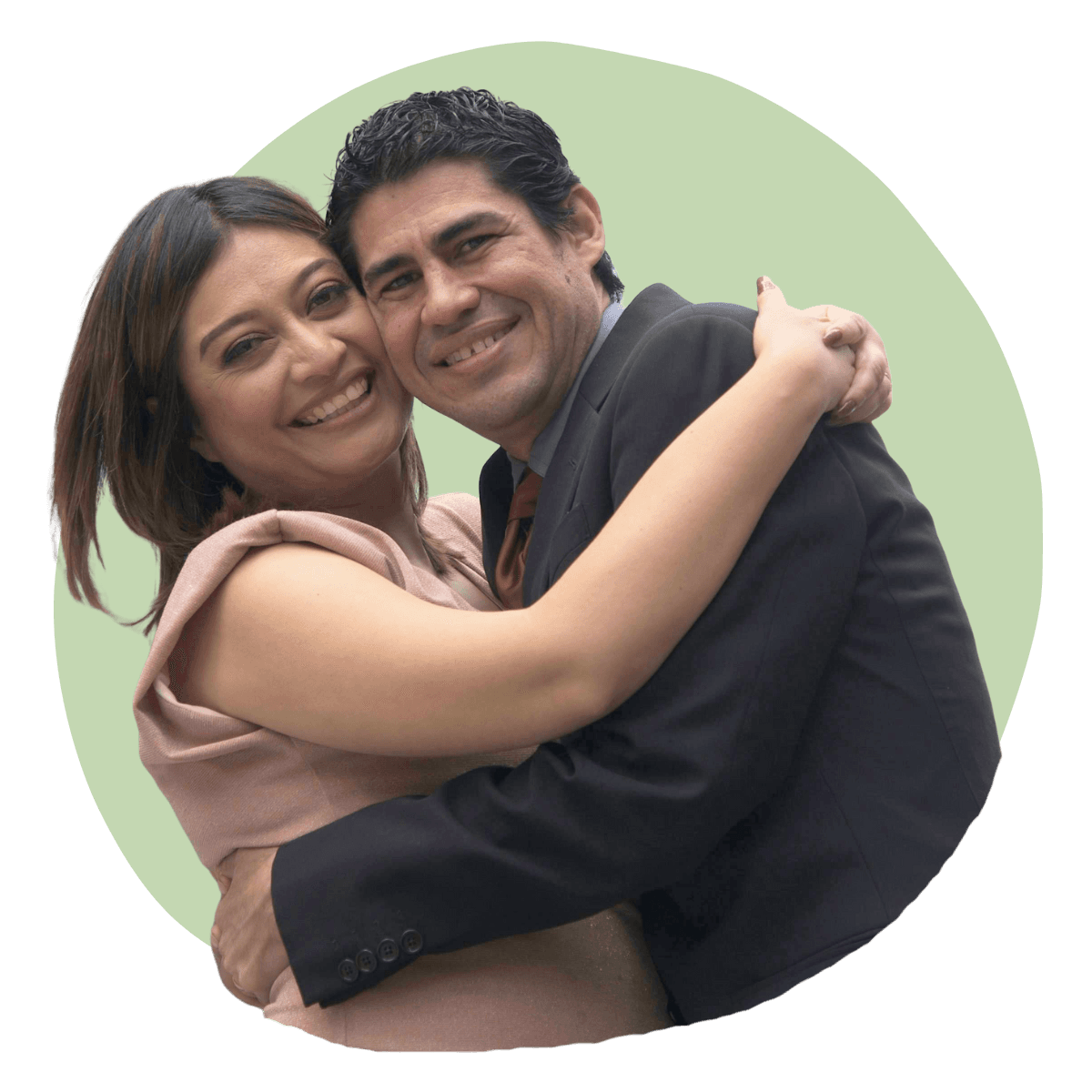 Smiling woman giving a piggyback ride to a laughing young girl.